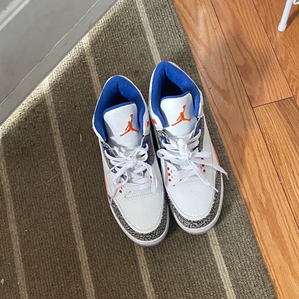 Jordan White and Blue Sneakers with Orange Accents